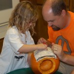 dad and nik carving pumpkin2